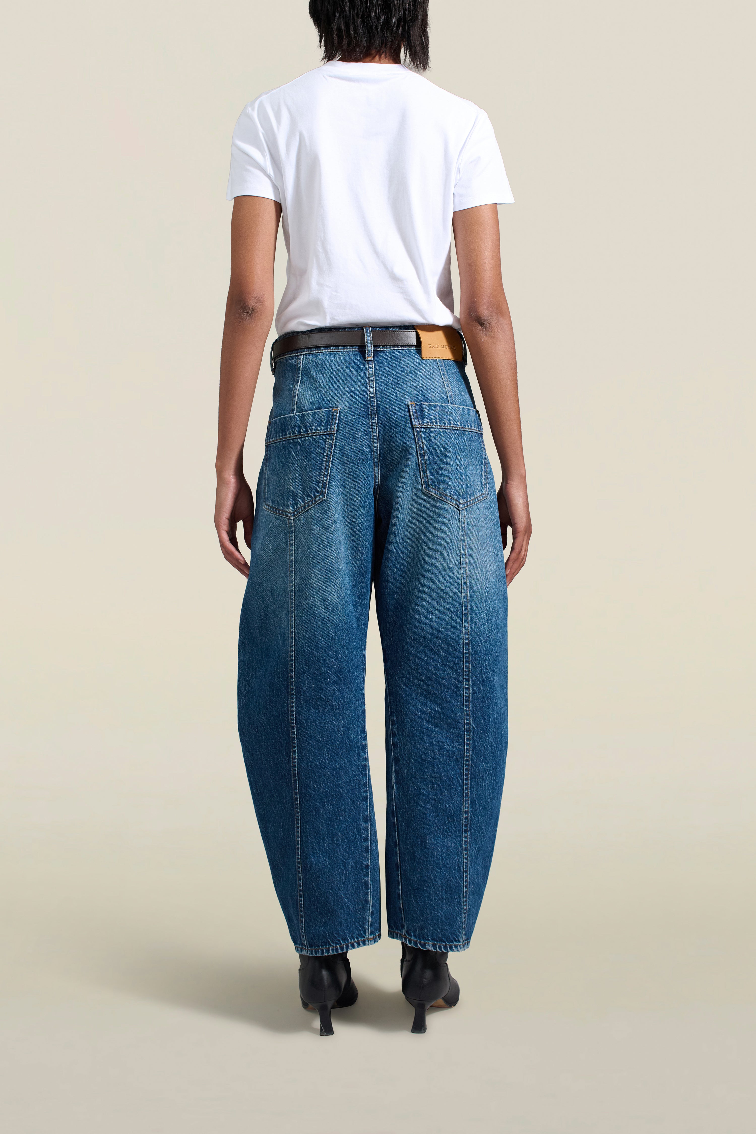 Clemence Jean in Dark Stonewash